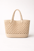 Voura natural cream crochet beach bag open weave summer tote white background