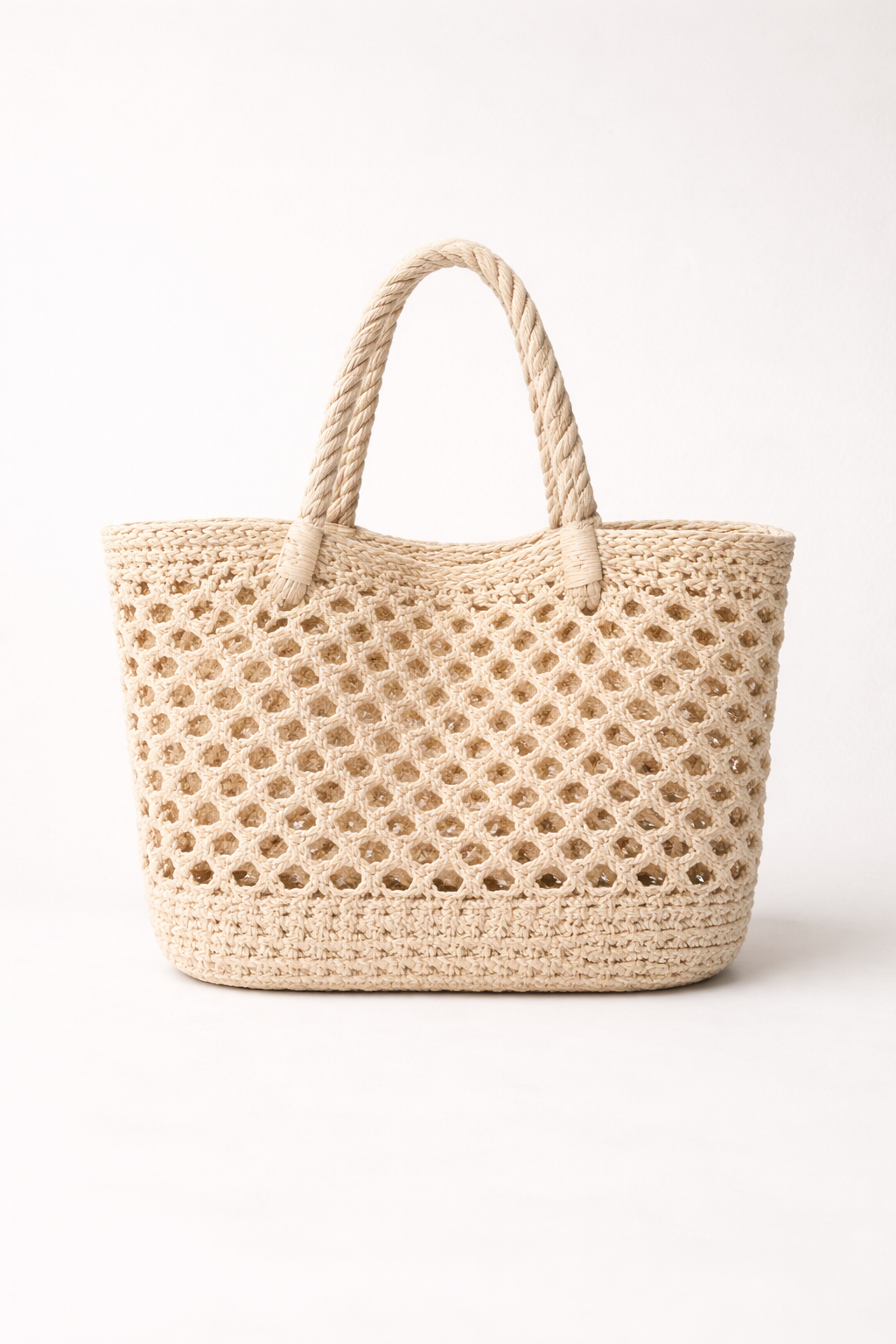 Voura natural cream crochet beach bag open weave summer tote white background