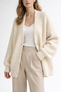 Voura oat cream chunky rib oversized knit cardigan flat lay white background