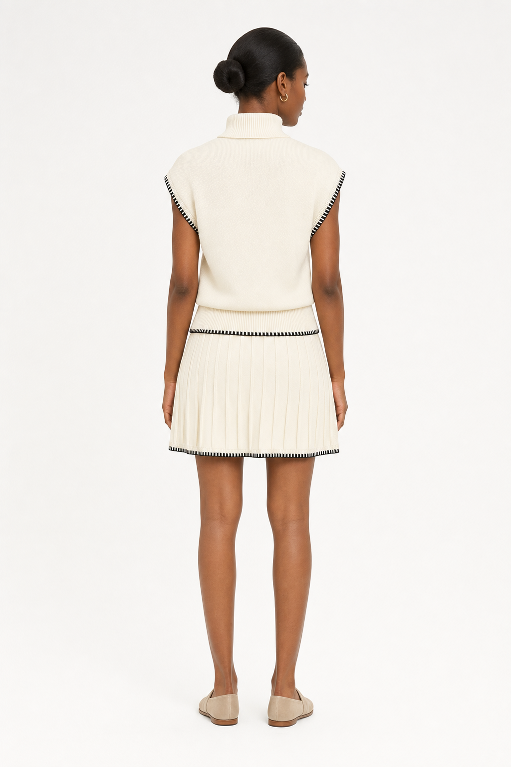knit turtleneck top and mini skirt co-ord set sleeveless contrast stitch trim, cream — second studio view