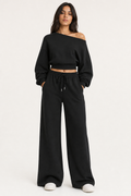 sweatshirt off-shoulder top and wide-leg drawstring trouser co-ord set cropped relaxed, black — front view