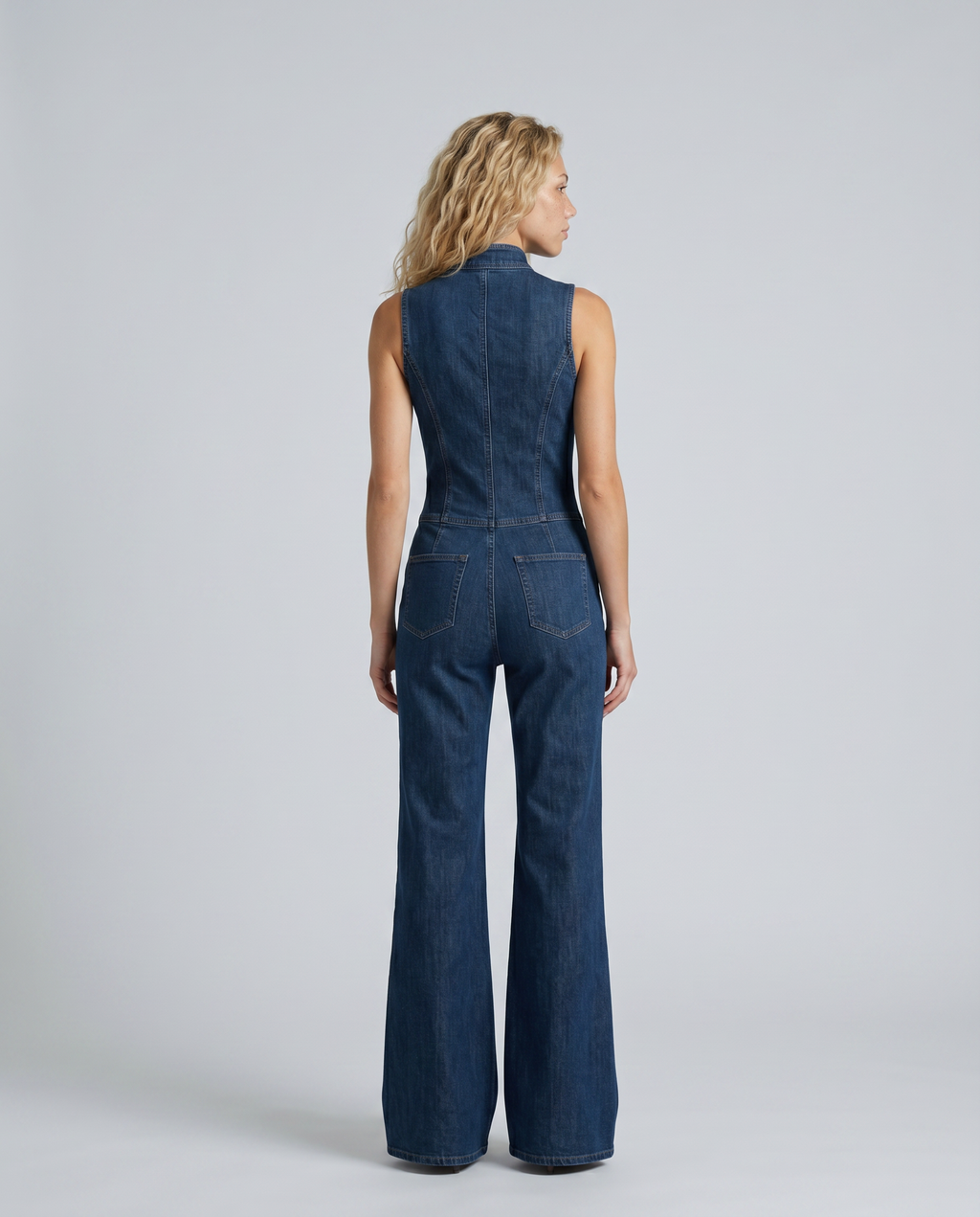 denim sleeveless flared jumpsuit, mid blue - worn view