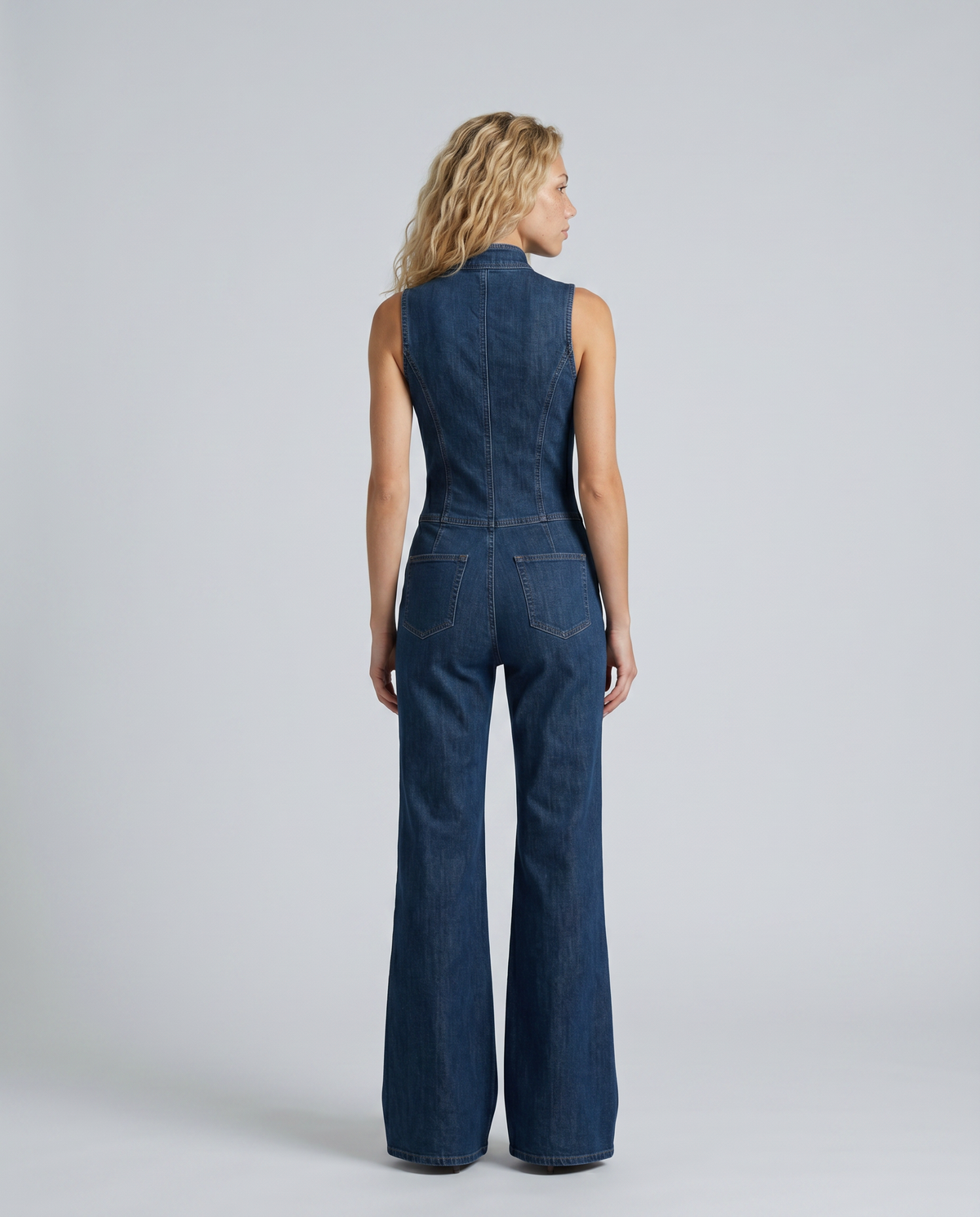 denim sleeveless flared jumpsuit, mid blue - worn view