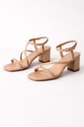 Voura tan block heel strappy sandals summer and occasion white studio background