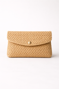 Voura natural raffia fold-over clutch bag evening occasion white studio background